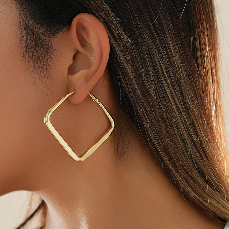 Pendientes clásicos elegantes cuadrados de cobre para mujer